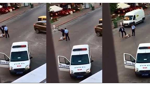 İki polis, bir kadını copla dövüp tekme attı, saçından tutup yerlerde sürükledi!