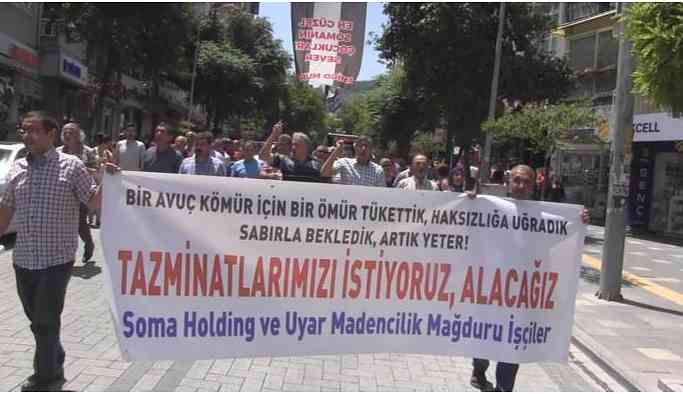 Soma faciasında sağ kurtulan işçiler tazminatları için yürüdü