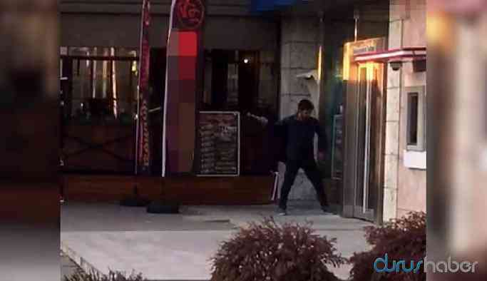 Cezaevine girmek isteyen kişi banka camını kırdı