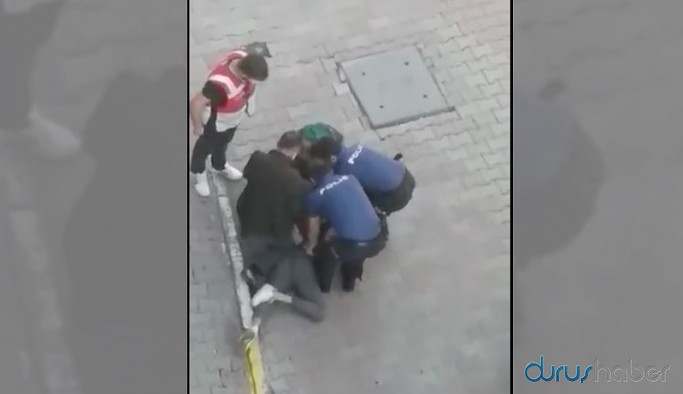 Yine polis şiddeti... Sitenin önüne çıkan genç darp edilip gözaltına alındı