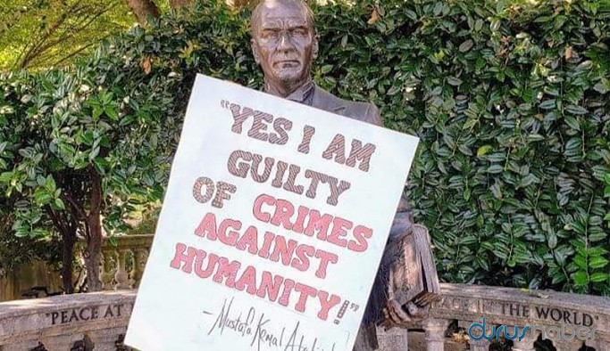 Atatürk heykeline 'Evet, insanlığa karşı işlenen suçlardan suçluyum' yazısını koydular