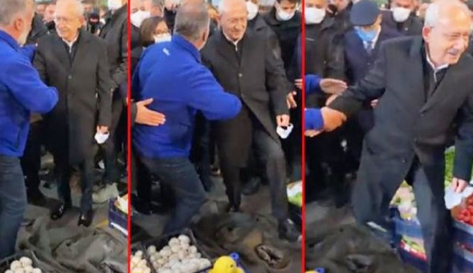 Esnaf, Kılıçdaroğlu'nun önüne 'Kırmızı halımız yok' diyerek montunu serdi