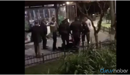 Bekçiler üzerinin aranmasına izin vermeyen vatandaşı demirlere kelepçeledi
