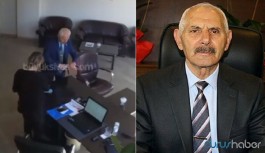 MHP'den ihraç edilen belediye başkanı Erdoğan'ın fotoğrafını yırttı